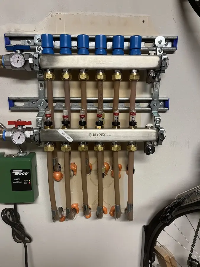 Plumber performing Leak Detection at a residential property in Grosse Pointe Park